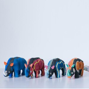 Image of four colourful, handcrafted rhino trinkets
